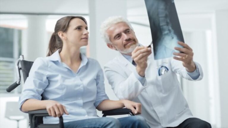 Radiologist Examining Woman's Xray