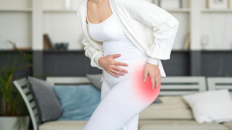 Woman Suffering from Bursitis on Her Hips